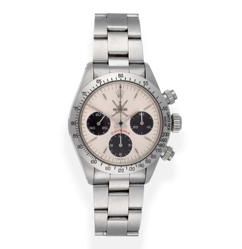 A Fine and Rare Stainless Steel Chronograph Wristwatch with the White "Khanjar" National Symbol of Oman, signed Rolex, model: Daytona, "so called Big Red", ref: 6263/6265, 1979